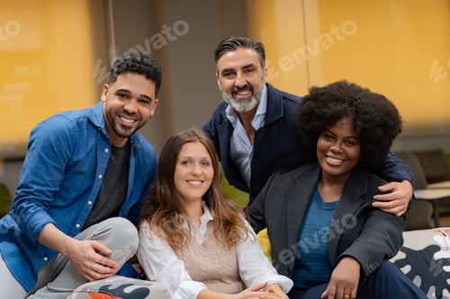 Preview: Diverse team of colleagues smiling together.
