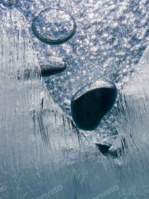 Preview: Air bubbles trapped under frozen ice surface