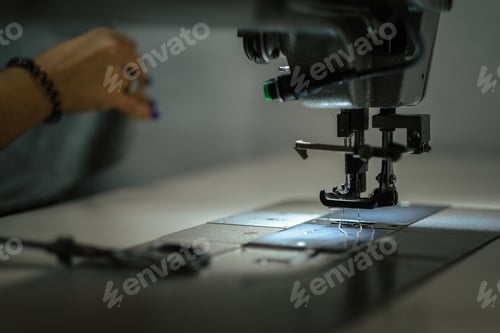 Preview: Closeup shot of an industrial sewing machine