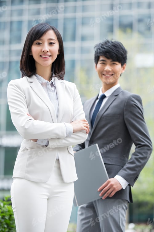 Preview: Young business people outdoors