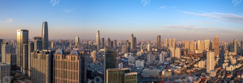 Preview: Aerial shot of urban buildings, tourist attractions and landmarks in Tianjin, China at sunset