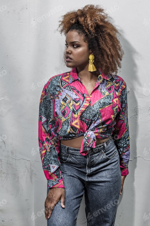 Preview: Stylish independent ethnic female in bright outfit