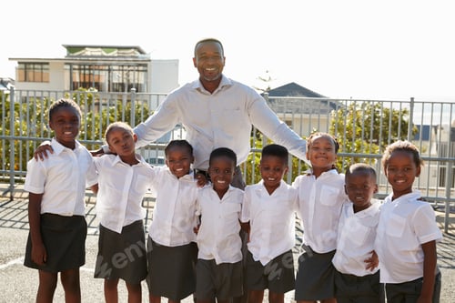 Preview: Teacher and elementary school kids in playground, portrait