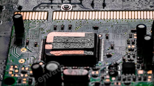 Preview: Closeup shot of details of components and microchips on a PC circuit board