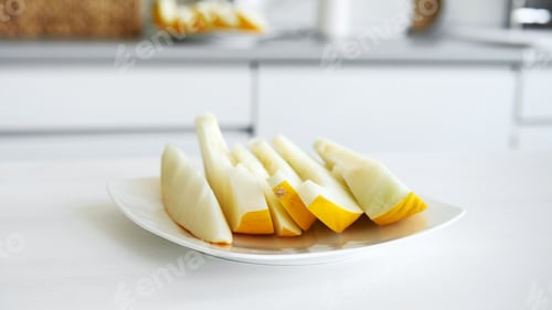 Preview: Sliced Melon On Plate