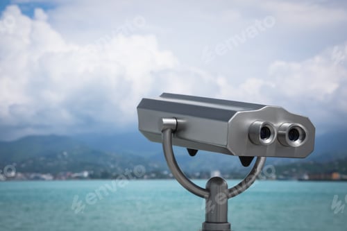 Preview: Metal tower viewer installed near sea, space for text. Mounted binoculars