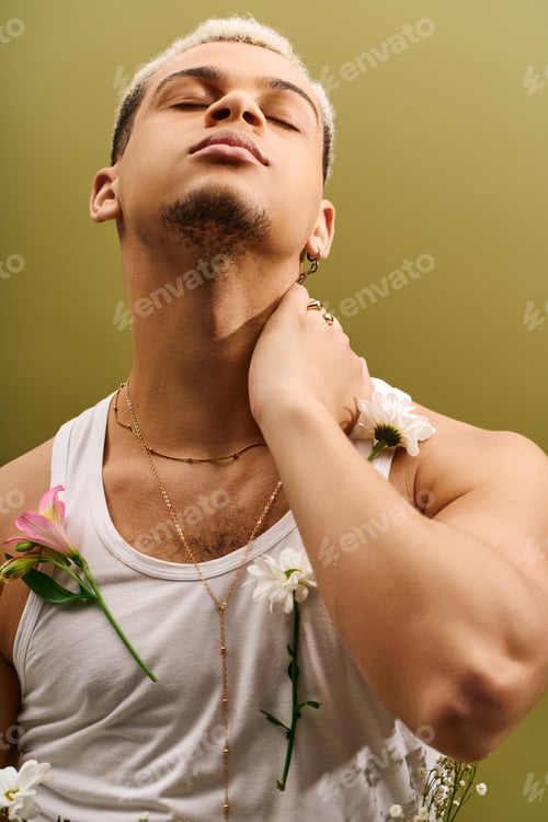 Preview: Elegant expression of youth and style in a floral-themed studio setting