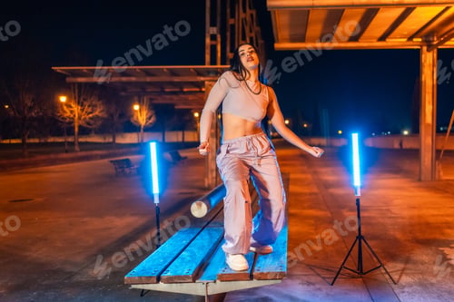 Preview: Trap artist dancing on a park table at night