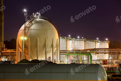 Preview: Oil And Gas Storage Tanks At Night