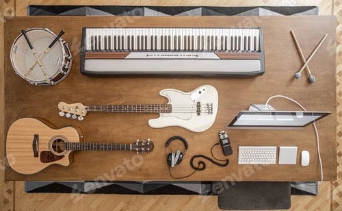 Preview: Top view of a composition of musical instruments on a wooden table in a recording studio.