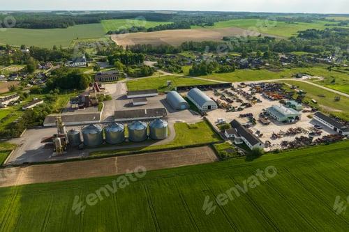 Preview: aerial view on agro silos granary elevator on agro-processing manufacturing plant for processing dry