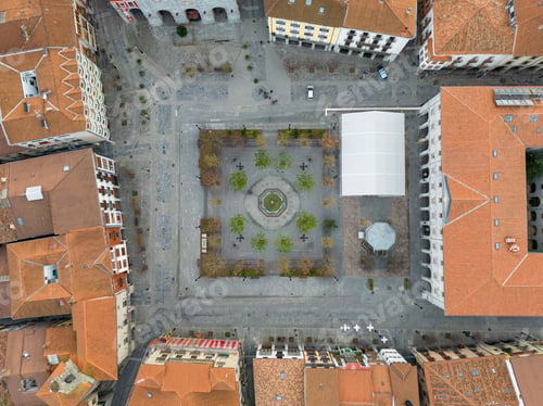 Preview: Aerial top view of orange roofs of houses in a village in Basque Country