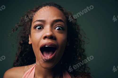 Surprised Young Woman with Mouth Open Portrait