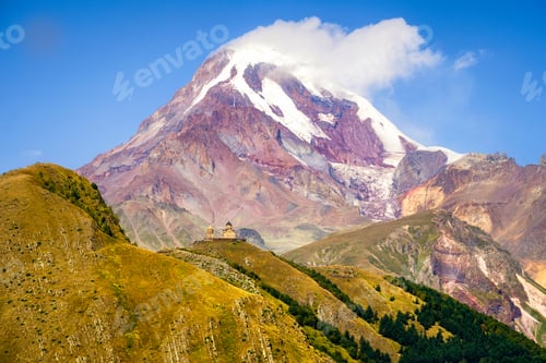 Preview: Landscape view of Kazbeg mountain and Tsminda sameba church, Geo