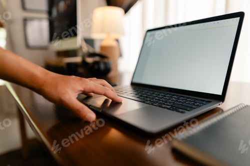 Preview: Hands working on laptop computer and internet ,blank screen