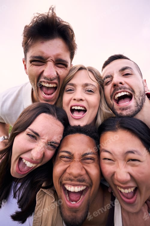 Preview: Vertical portrait multiracial friends excited outdoors. Group diverse young people funny expression.