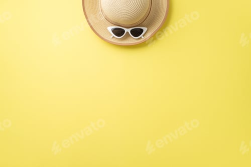Preview: Summer adventure awaits. Top view of beach essentials including stylish sunglasses