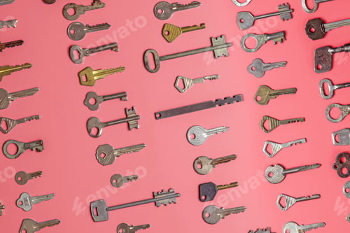 Preview: Keys set on pink background. Door lock keys and safes for proper