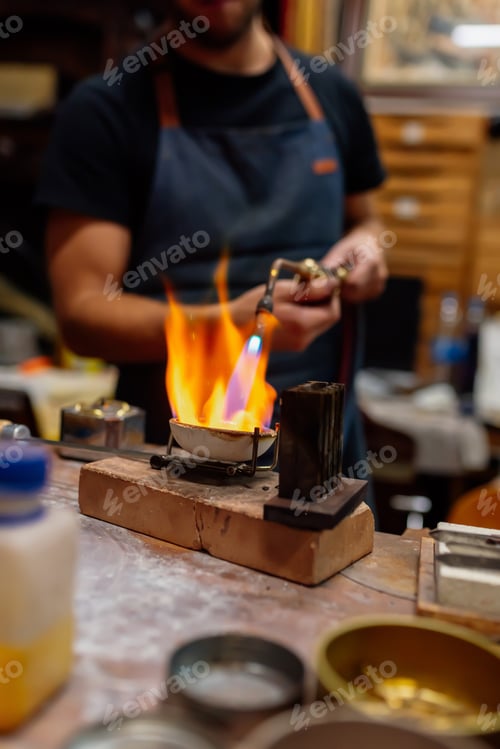 Preview: man working with a blowtorch