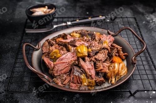 Preview: Braised Beef Cheek Stew, traditional Slow cooked meat. black background. top view
