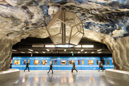 Preview: Moving train with somebody station Tekniska Hogskolan. walking at the Stockholm underground metro