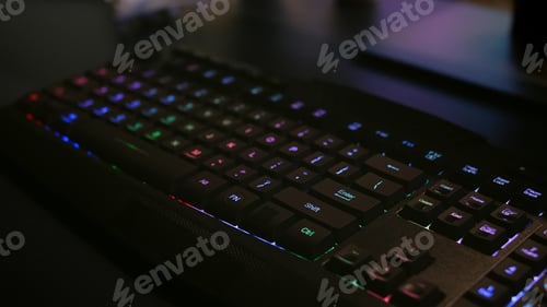 Preview: Close-up of professional keyboard with RGB lighting