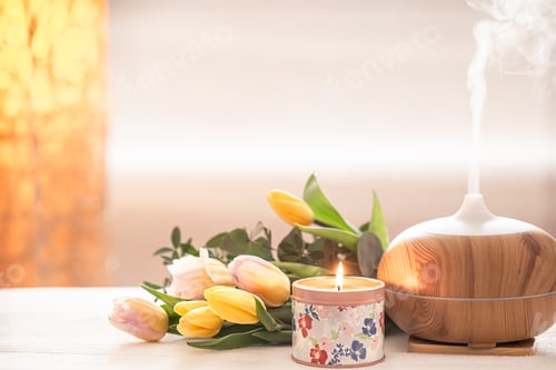 Preview: Aroma oil diffuser lamp on the table .