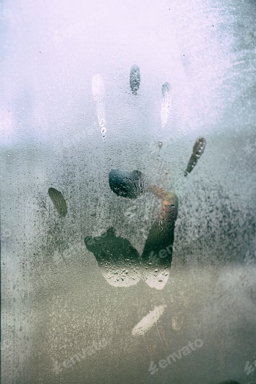Preview: Hand print in a wet window