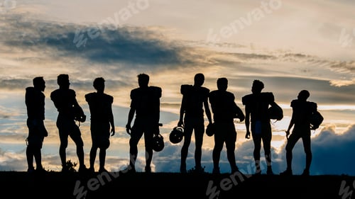 Preview: Silhouette of group of young american football players, standing in row