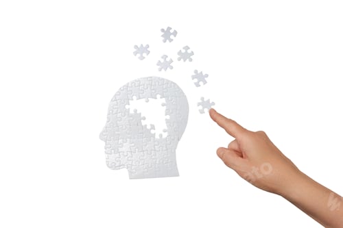 Preview: Hand gesturing at floating puzzle pieces, on white background