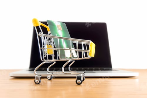 Preview: Online Shopping Concept with Credit Card and Laptop