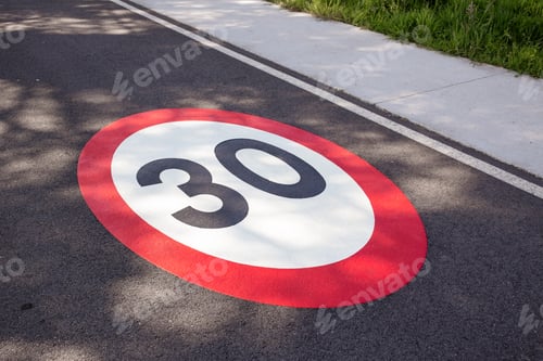 Preview: 30 kilometers hour speed limit sign on the road
