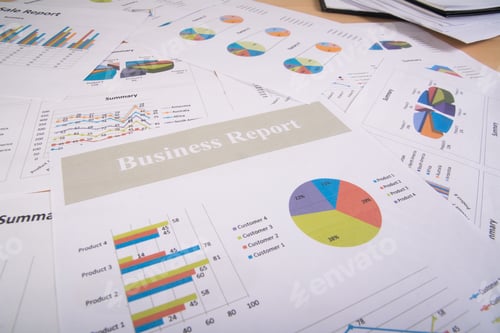 Vista previa: Business report. Graphs and charts. Business reports and pile of documents. Business concept.