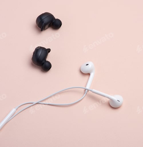 Preview: Black wireless and white earphones with wire