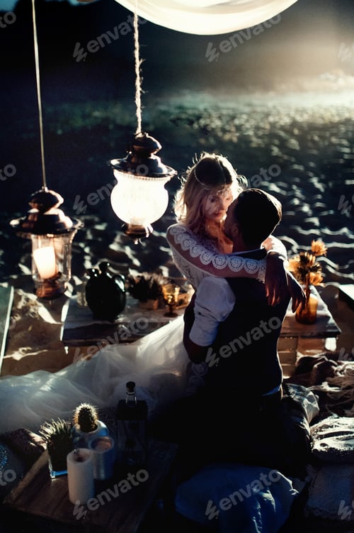 Preview: Girl is sitting near her boyfriend in the evening in the desert