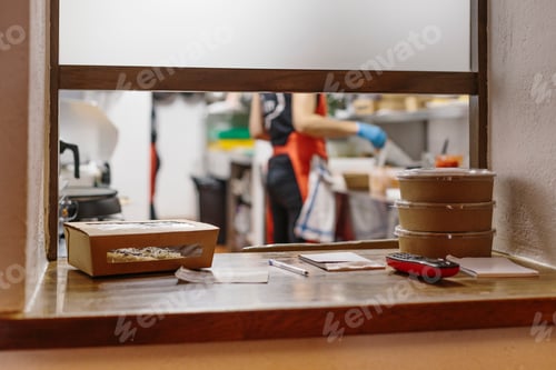 Preview: Cooks preparing takeaway food