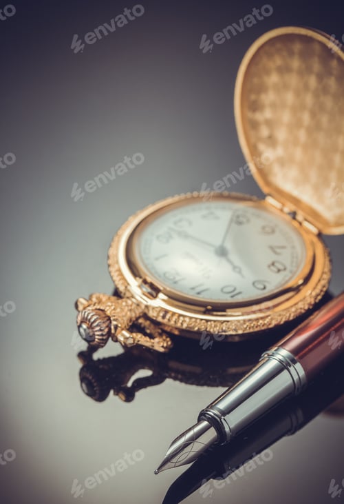 Preview: pocket watch and ink pen on black