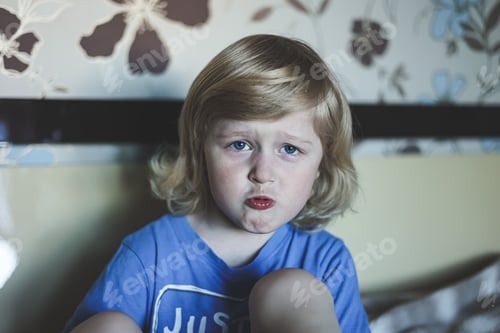 Preview: Cute five years old blonde boy with sad crying emotions facial expression bad mood. Mental health. N