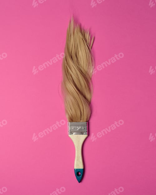 Preview: Paintbrush with soft blonde hair bristles on vibrant pink background