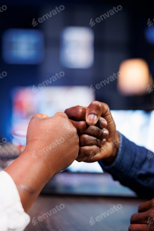 Preview: Black people fist bumping each other