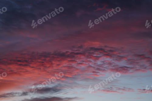 Preview: Purple sunset. Fluffy clouds. Romantic sky. Universal horizontal photo. The background picture.