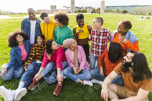Preview: Group of young multiracial friends having fun together in park - Friendship and diversity concept
