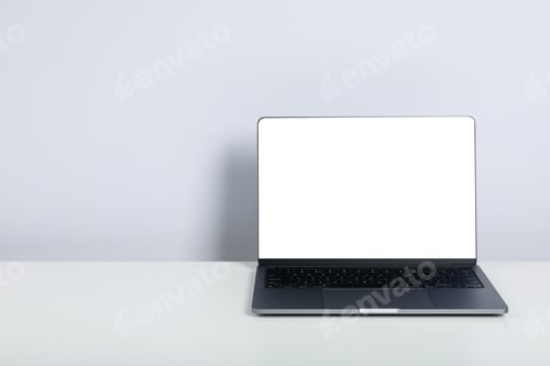 Preview: Open laptop with blank screen on white table