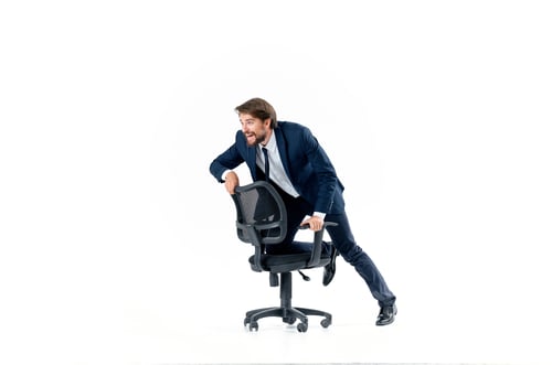 Preview: business man rolling in a chair entertainment work office