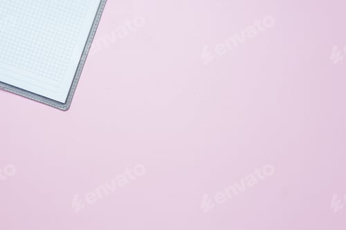 Preview: Single simple empty white notebook with a blank for drawing or writing, on pink background Top view