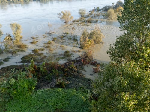 Preview: Po River flooding its banks after heavy rain in rural countryside in Stagno Lombardo, Cremona, Italy