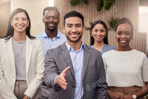 Preview: Shot of a team of businessman ready to shake hands with his team
