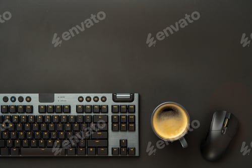 Preview: Computer keyboard and mouse on black background