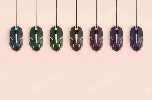 Preview: Several computer mice hang on a pastel peach background