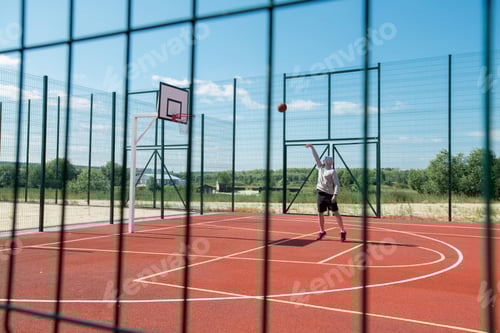 Preview: Young Man Throwing Ball